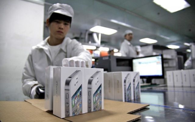 photo of Apple supplier threatens to sue newspaper over cancerous chemicals claim image