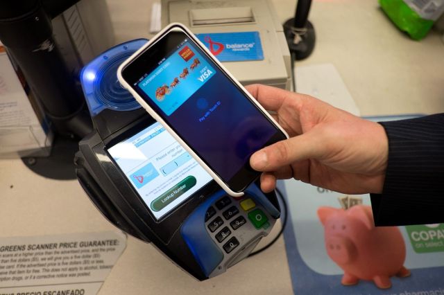 photo of CVS and Rite Aid block Apple Pay as mobile wallet war heats up image