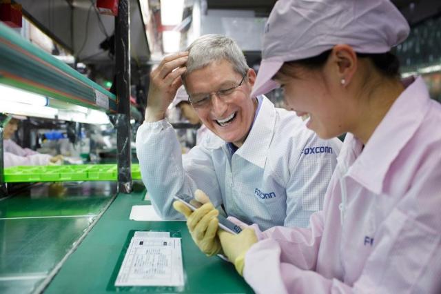 photo of Tim Cook tweets a picture of himself building an iPhone 6 at Foxconn image