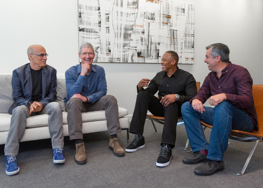 Jimmy Iovine, Tim Cook, Andre Young, and Eddie Cue. Photo: Apple