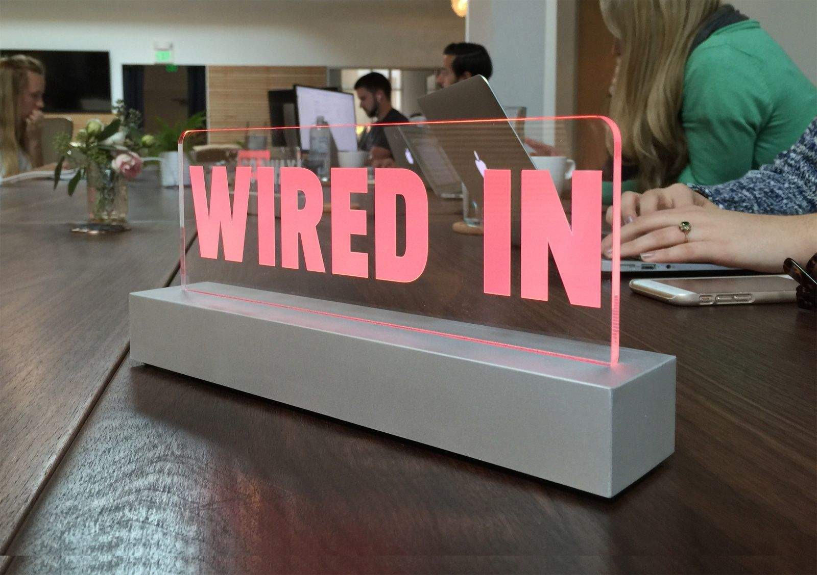 A Wired In sign for the desk can let co-workers know you can not be disturbed.