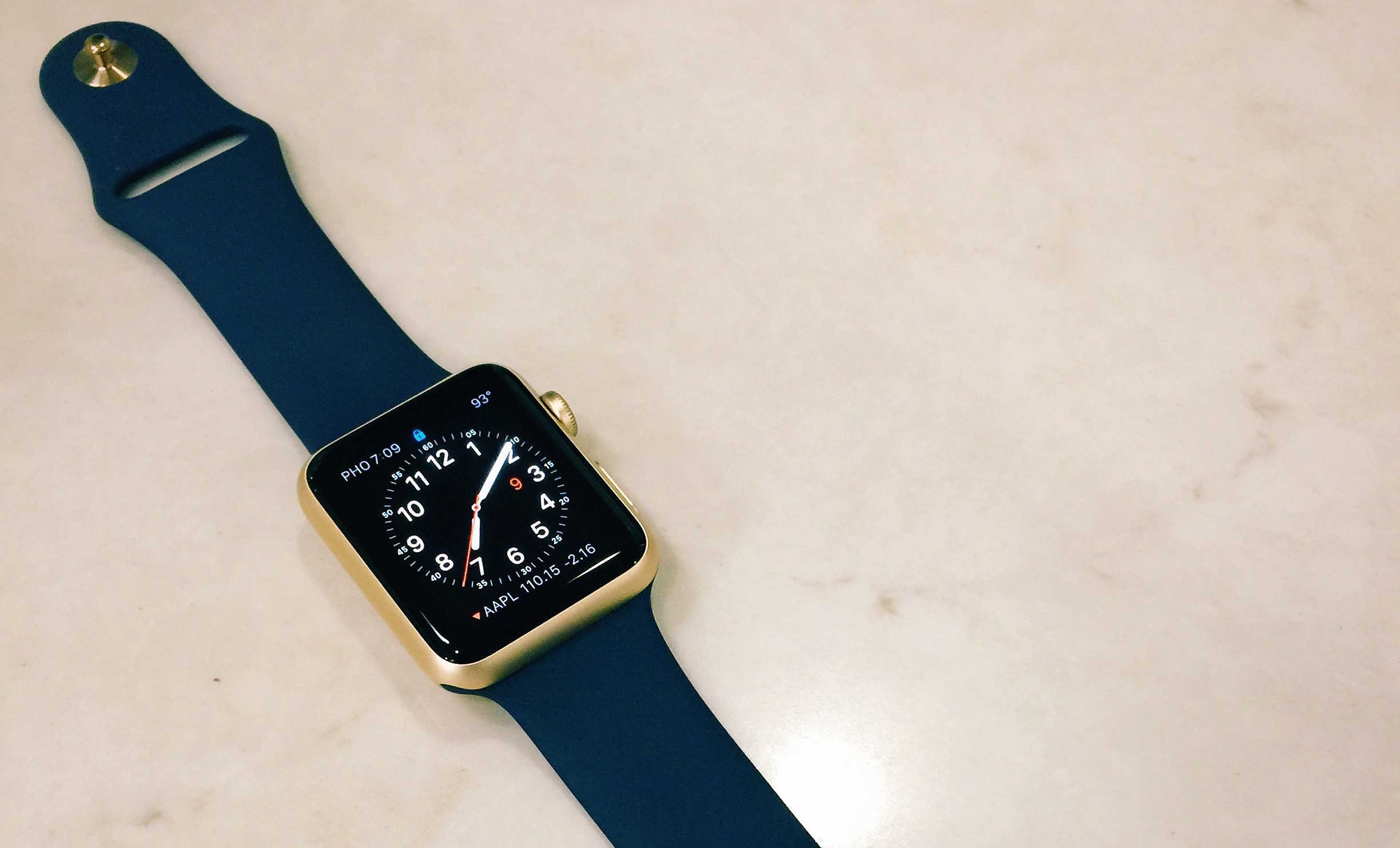 The gold Apple Watch looks great with a navy band.