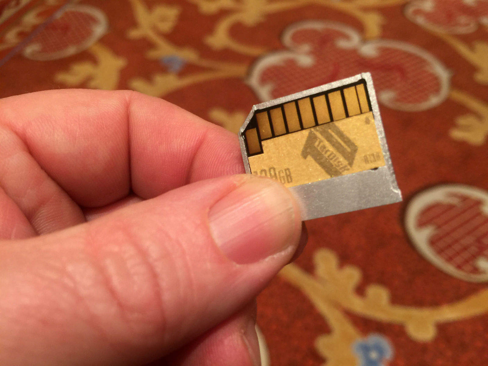 The tiny TarDisk Pear slides into your MacBook's SD card slot and doubles your storage almost instantly.