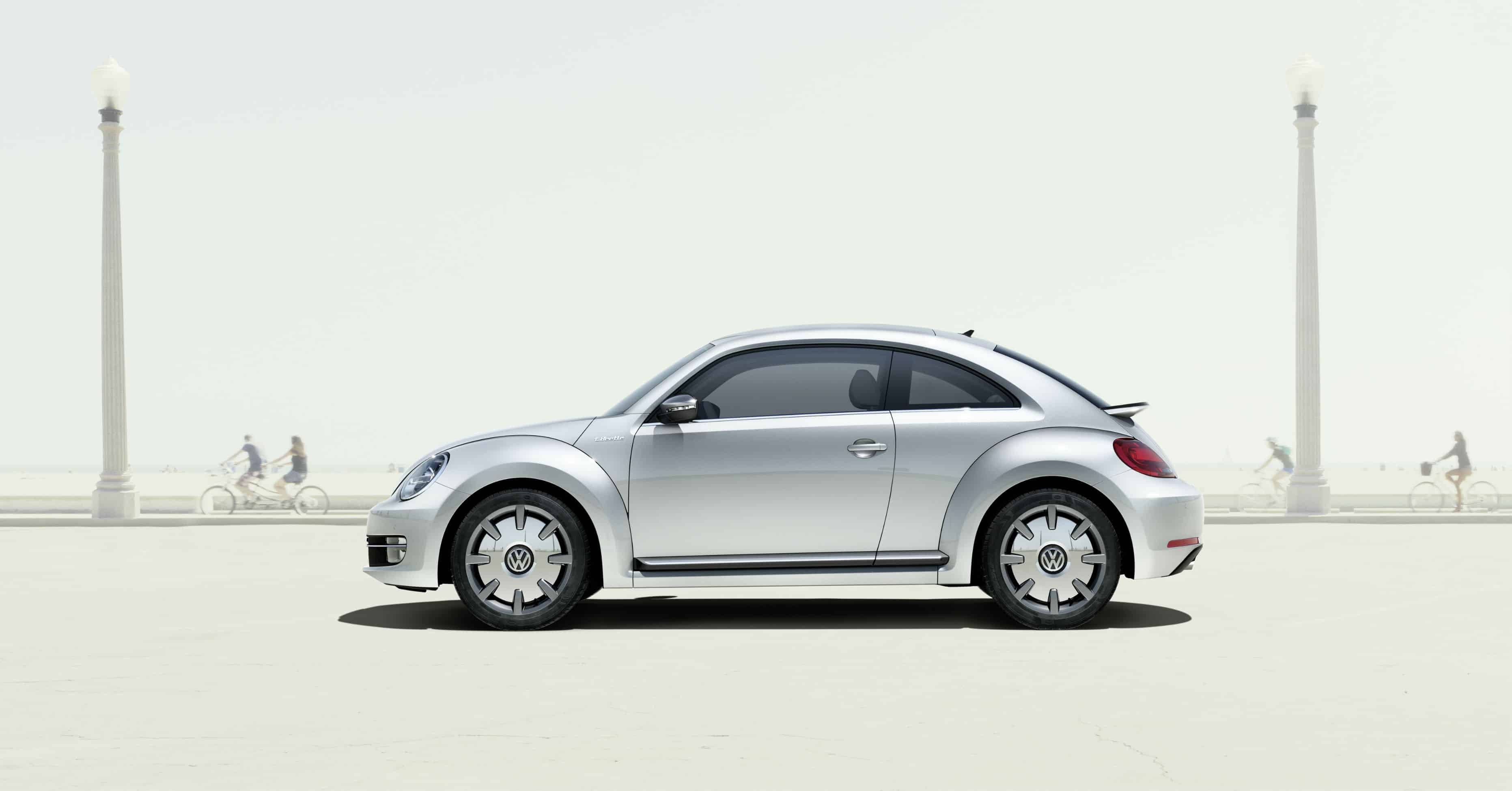 The first Apple car, a collaboration with VW known as the iBeetle, rolls onto the scene.