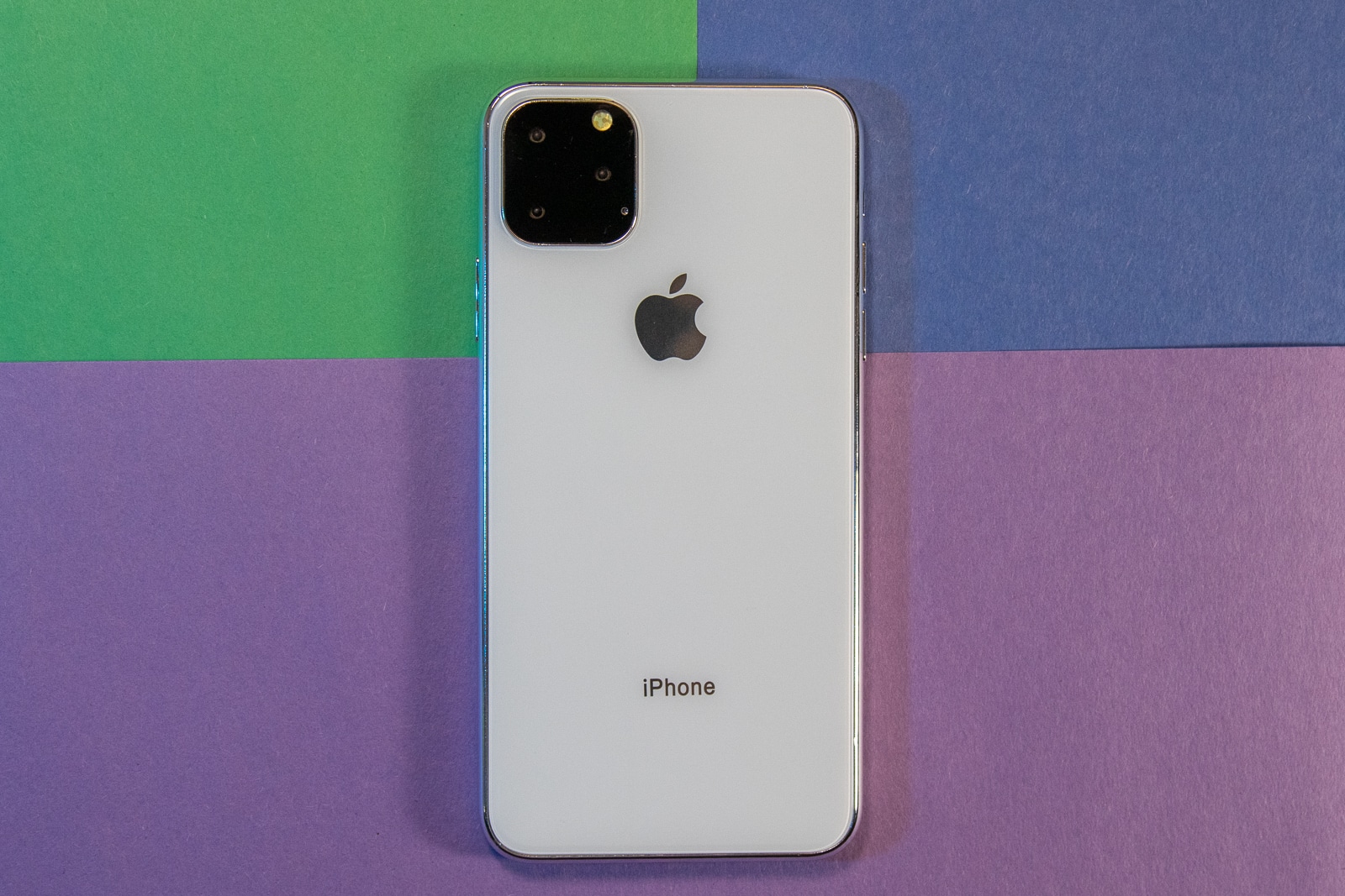 iPhone 11 Max on colorful background