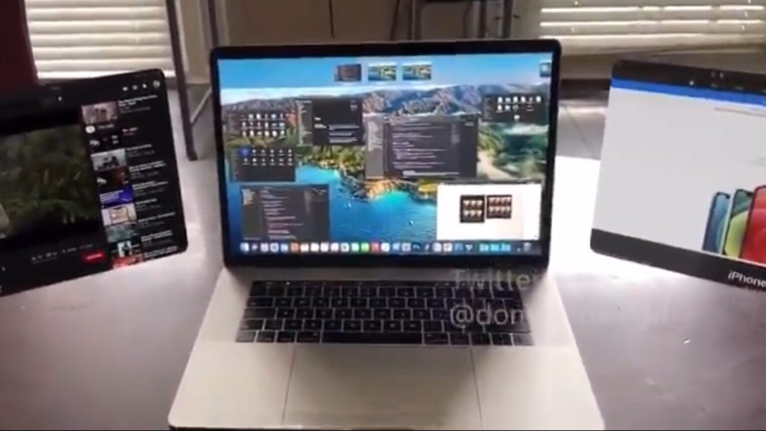 An AR concept shows a MacBook with augmented-reality displays.